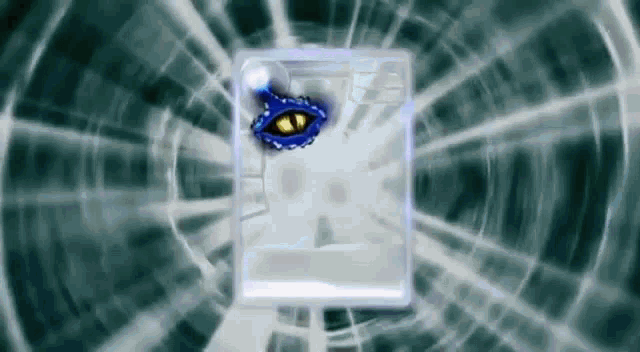 a blue eye is coming out of a white box in a dark tunnel .