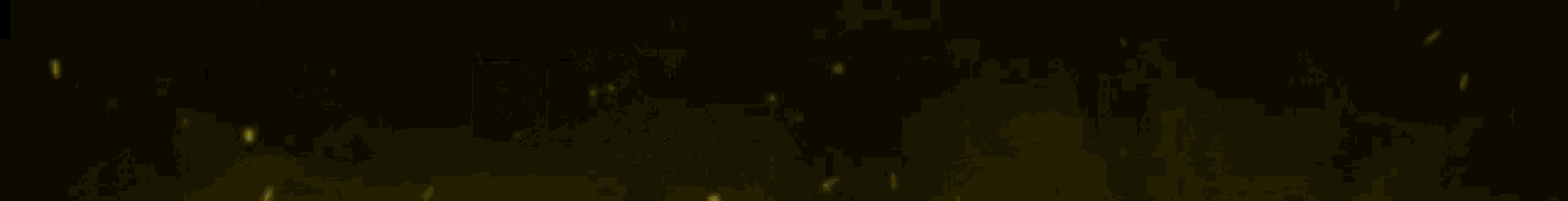 a close up of a yellow lightning bolt on a dark background .