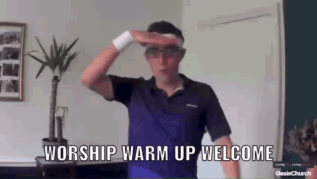 a man wearing glasses and a headband says " worship warm up welcome "