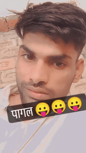 a man with smiley faces sticking out his tongue and a sign that says ' paigal ' on it