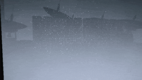 a gray background with a few dots on it