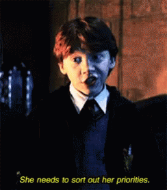 Ron Weasley Sort Out Her Priorities GIF - Ron Weasley Sort Out Her Priorities Harry Potter GIFs