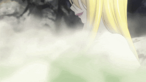 a woman with blonde hair is taking a bath in a pool of water