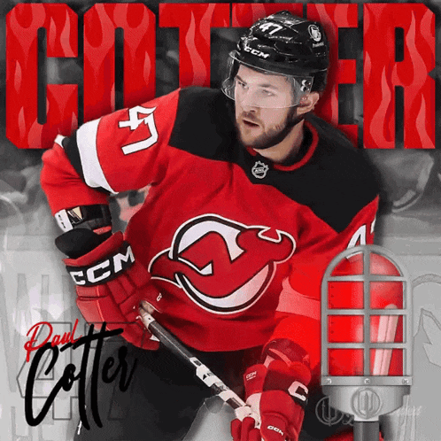 a hockey player wearing a red and black jersey with the number 41 on it