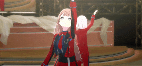 two anime girls are standing on a stage with their arms up