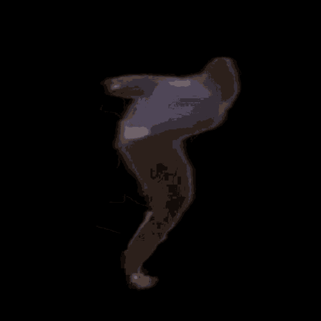 a silhouette of a person is dancing in the dark against a black background .