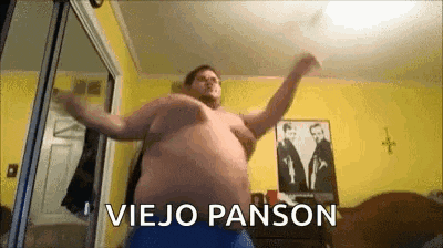 a man with a large belly is dancing in a room with the words viejo panson written on the bottom .