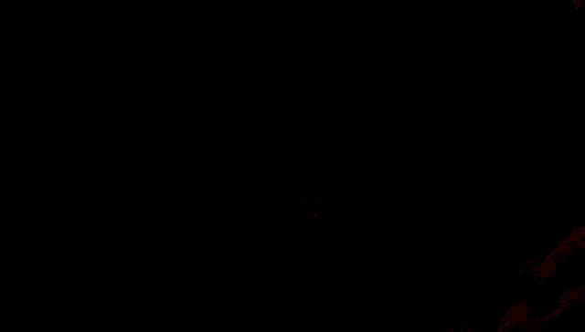 a fire circle with a light coming out of it