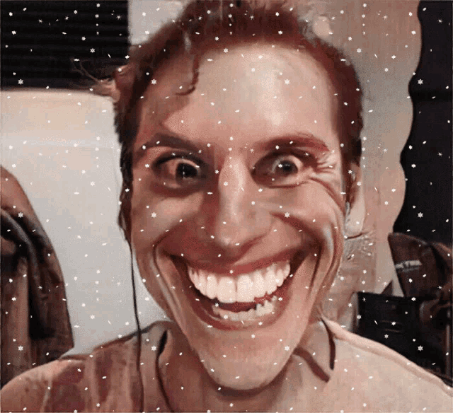a man with a big smile on his face