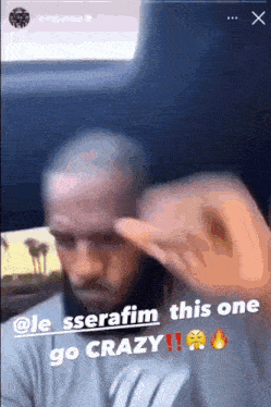 a blurry picture of a man with the words go crazy on the bottom