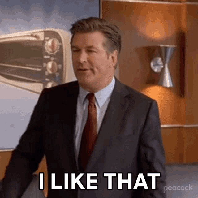 a man in a suit and tie says " i like that "
