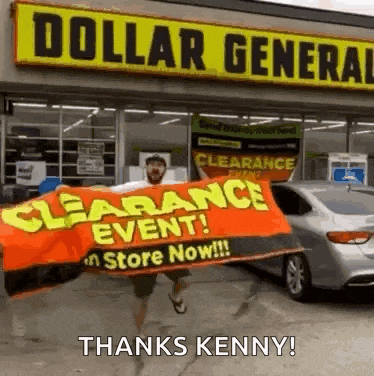 a man holding a clearance event sign in front of a dollar general store