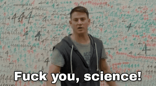 a man is standing in front of a wall with numbers on it and the words fuck you science