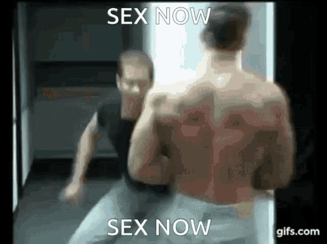 a man without a shirt is standing in front of a mirror with the words sex now written above him