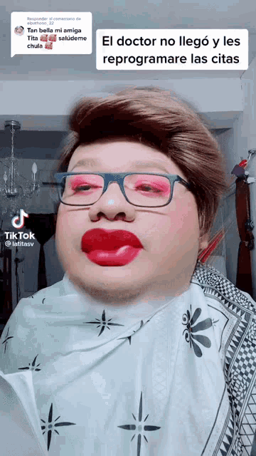 a man wearing glasses and red lipstick has a tiktok icon on his face
