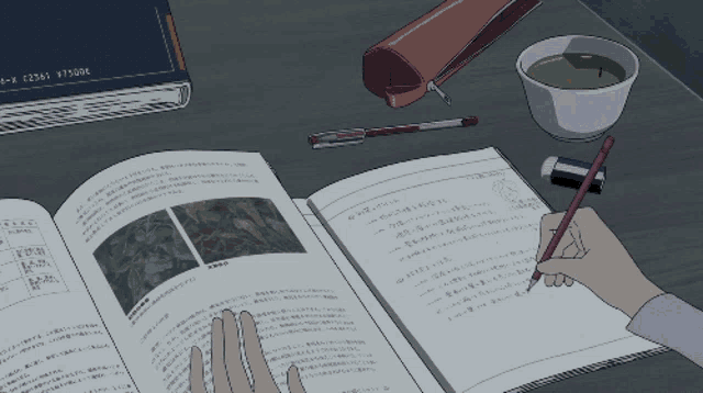 a person is writing on a piece of paper with a pencil and a cup of green tea