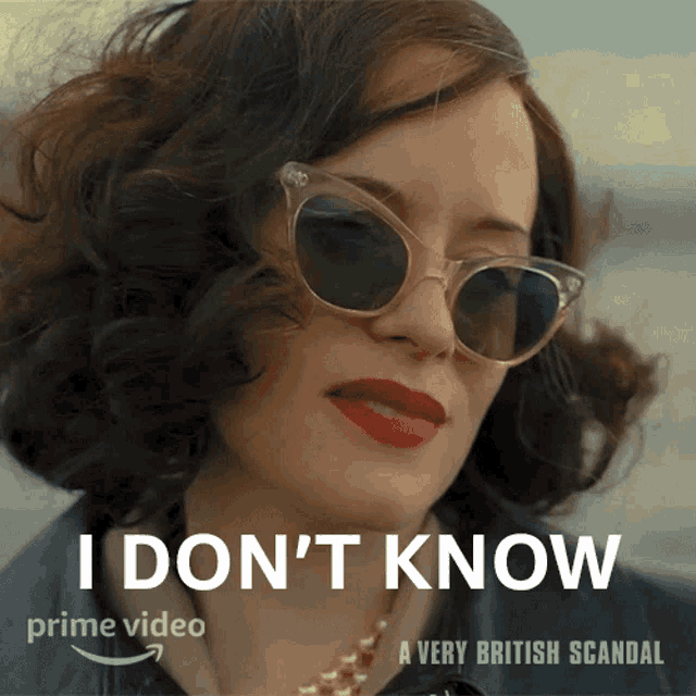 a woman wearing sunglasses and red lipstick says i don 't know a very british scandal