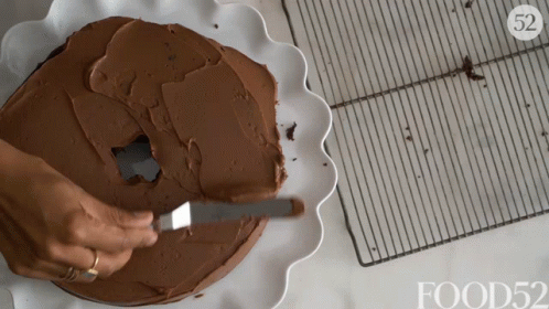 Spreading Bundt Cake GIF - Spreading Bundt Cake Chocolate GIFs