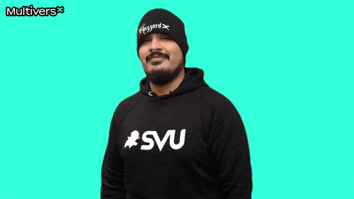 a man with a beard wearing a black hoodie that says syu on it