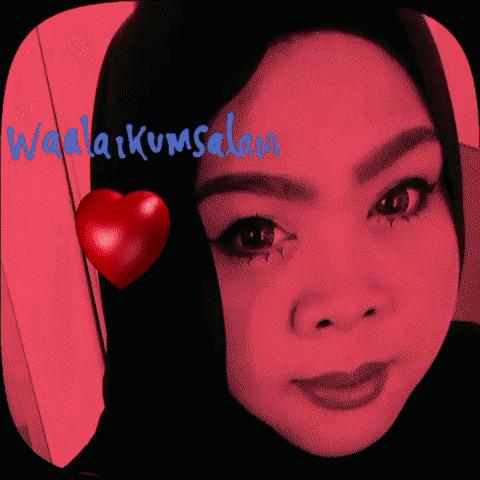 a woman 's face is shown with the words waalaikumsalam written on the bottom