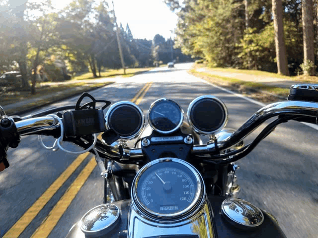 a harley davidson motorcycle is on the road