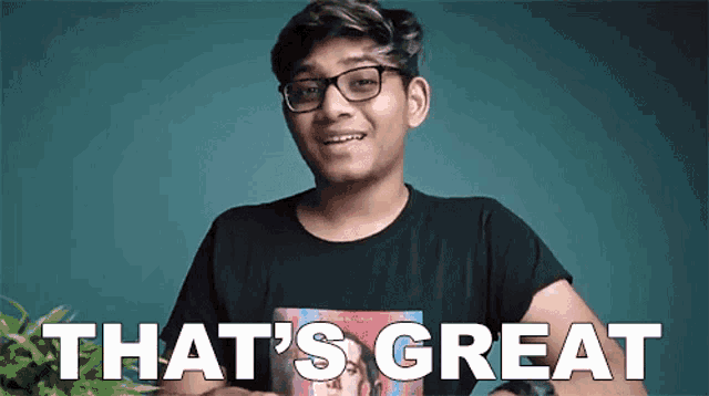 a young man wearing glasses and a black shirt says that 's great