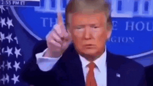 donald trump is giving a thumbs up while giving a speech .