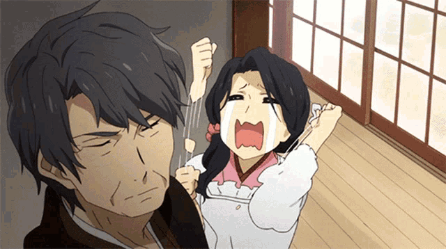 a man and a girl are standing next to each other