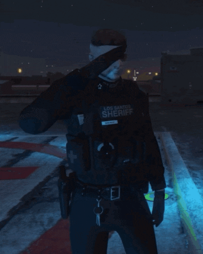 a man in a los santos sheriff uniform salutes at night