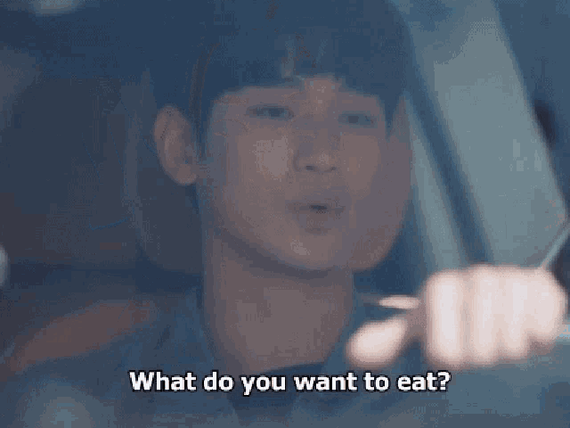 a woman with a 15 sign on her mouth is asking what do you want to eat