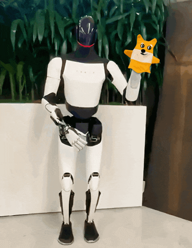 a robot is holding a puppet with a dog face on it