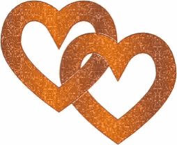 two rusty hearts are intertwined together on a white background .