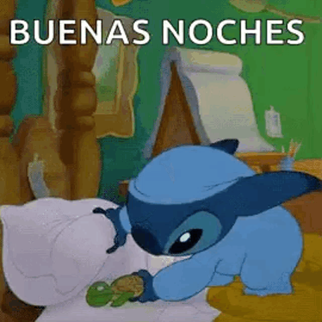 a cartoon character is laying in bed with a pillow and a green frog .