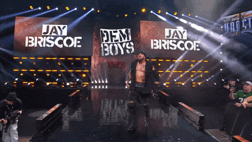 jay briscoe and dem boys are walking down the ramp