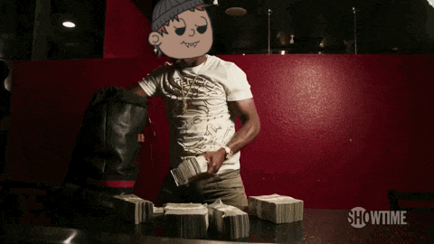 a man is standing in front of stacks of money with showtime written on the bottom