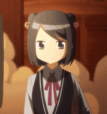 a girl with black hair and a red bow on her hair