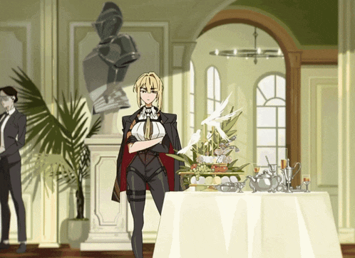 a woman in a suit is standing in front of a table