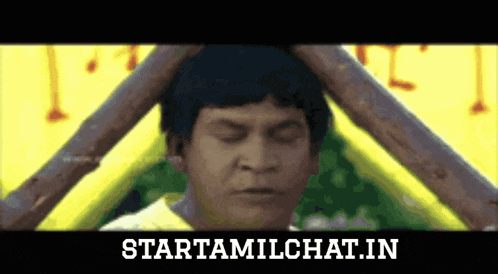 a man with his eyes closed in front of a sign that says startamilchat.in