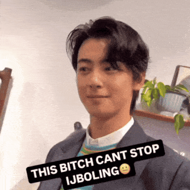 a man in a suit has a caption that says this bitch cant stop ijboling
