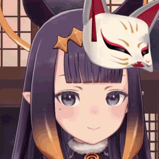 a girl with a cat mask on her head is smiling