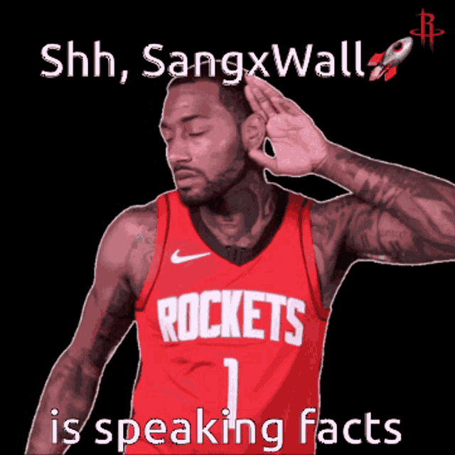 a man in a red rockets jersey is talking facts
