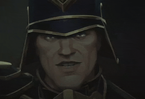 a close up of a man wearing a helmet and armor