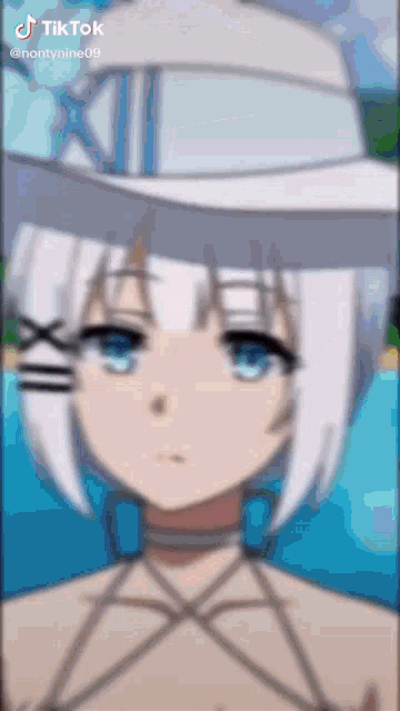 a girl with white hair and blue eyes is wearing a hat and a bikini .