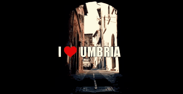 a sign that says i love umbria with a heart in the middle