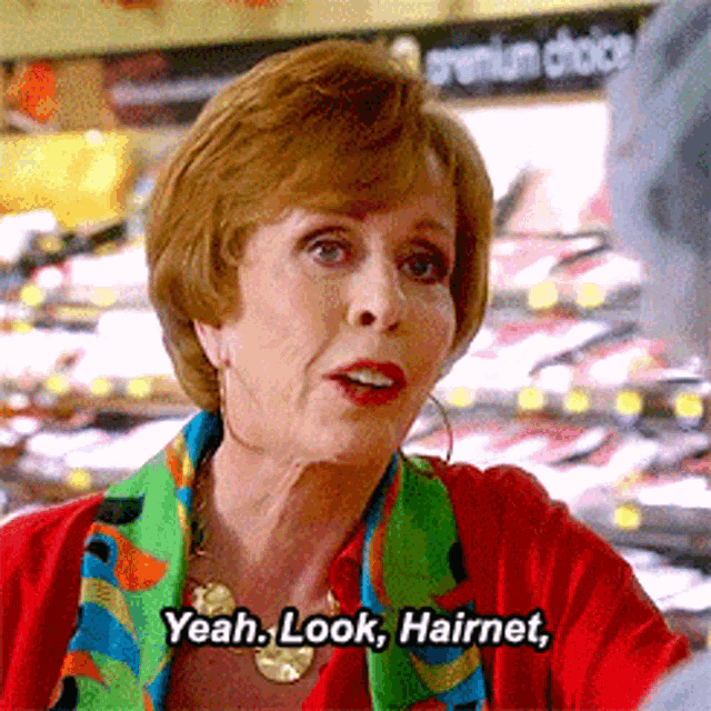 a woman says " yeah look hairnet " in a store