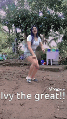 a woman is dancing in the dirt with the words ivy the great