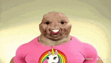 a man wearing a pink shirt with a rainbow unicorn on it