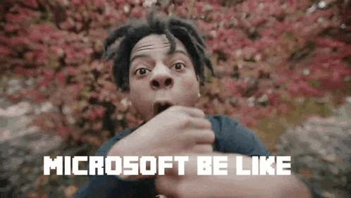 a man with a surprised look on his face and the words microsoft be like