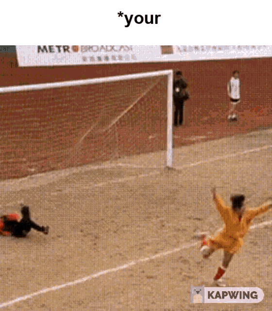 a soccer player is jumping in the air to catch a soccer ball in front of a goal .