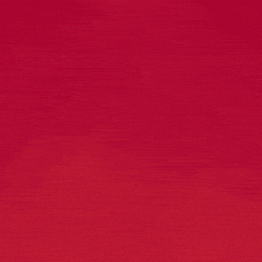 a soccer player wearing a sixt shirt stands in front of a red background